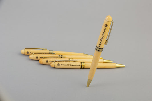 Wooden pen with NCA Logo